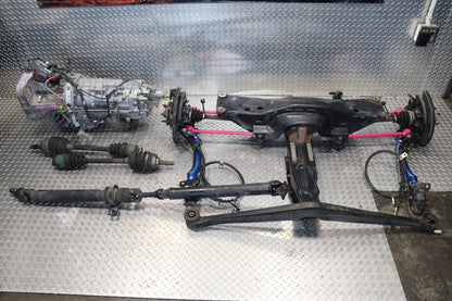 JDM TY856WB2GA SUBARU IMPREZA WRX STI S202 GDB 6 SPEED MANUAL AWD TRANSMISSION W/ COMPLETE REAR SUSPENSION CROSSMEMBER